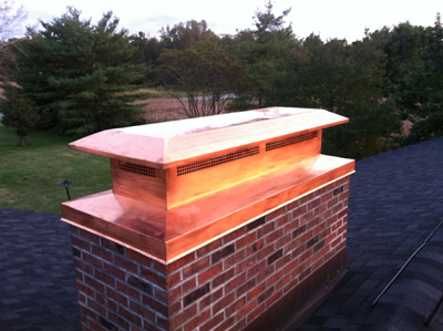 Before and after chimney cap replacement in Bellmore, NY