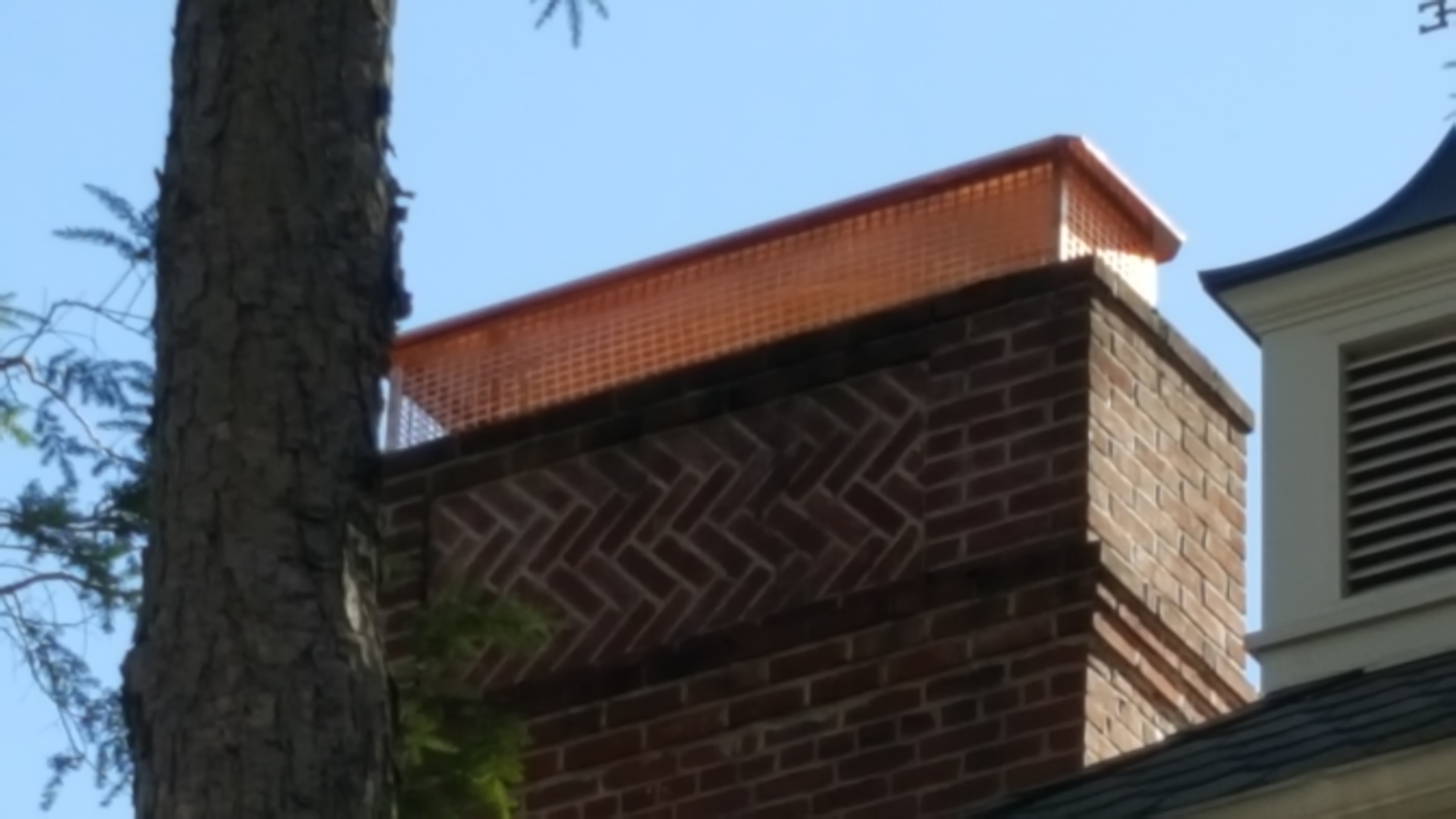 New stainless steel chimney cap installed in Bellmore, NY