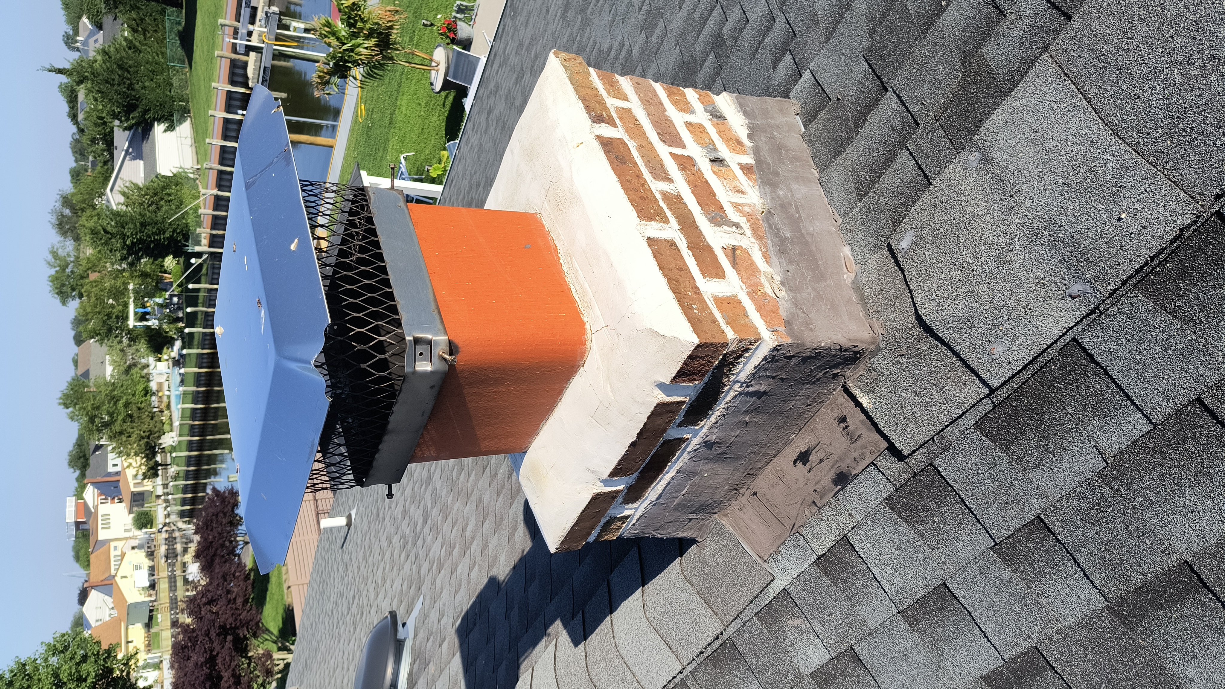 Full chimney masonry rebuild and restoration in Bellmore, NY